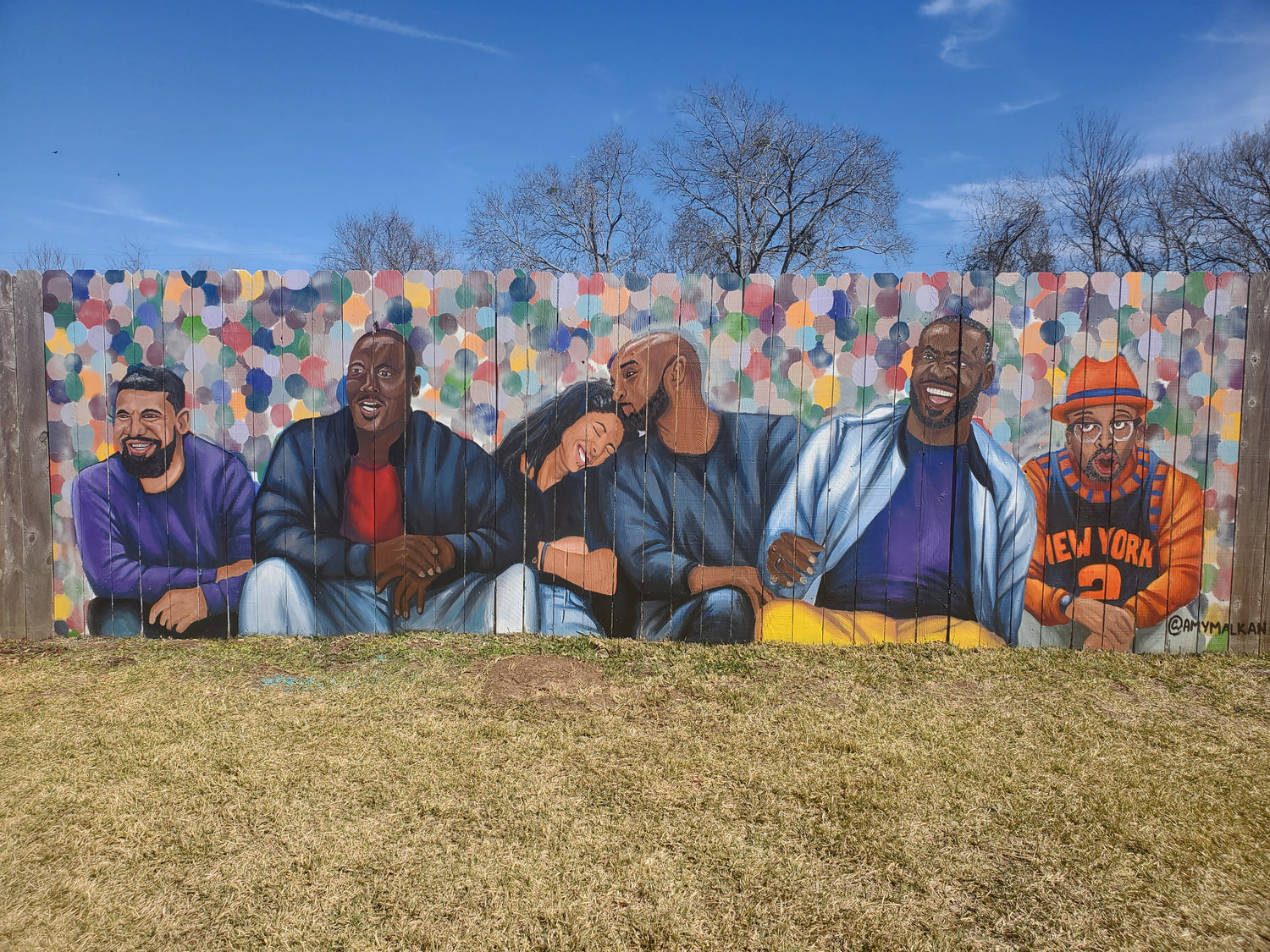 A mural tribute to Kobe Bryant and Gianna located at a private residence in Sugar Land, Texas. Mural is painted by Amy Malkan a female muralist and artist.